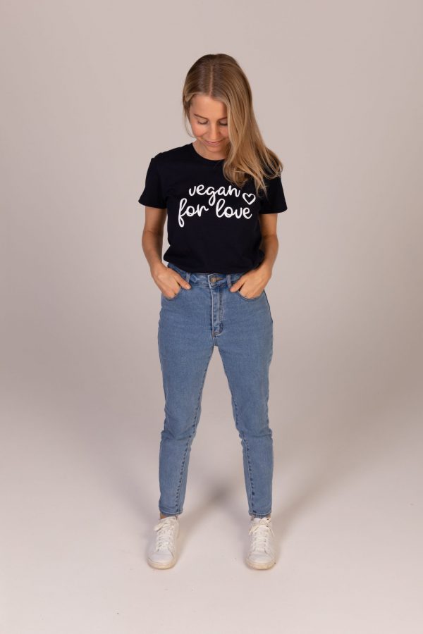 A photo of Olivia Budgen wearing her signature tee